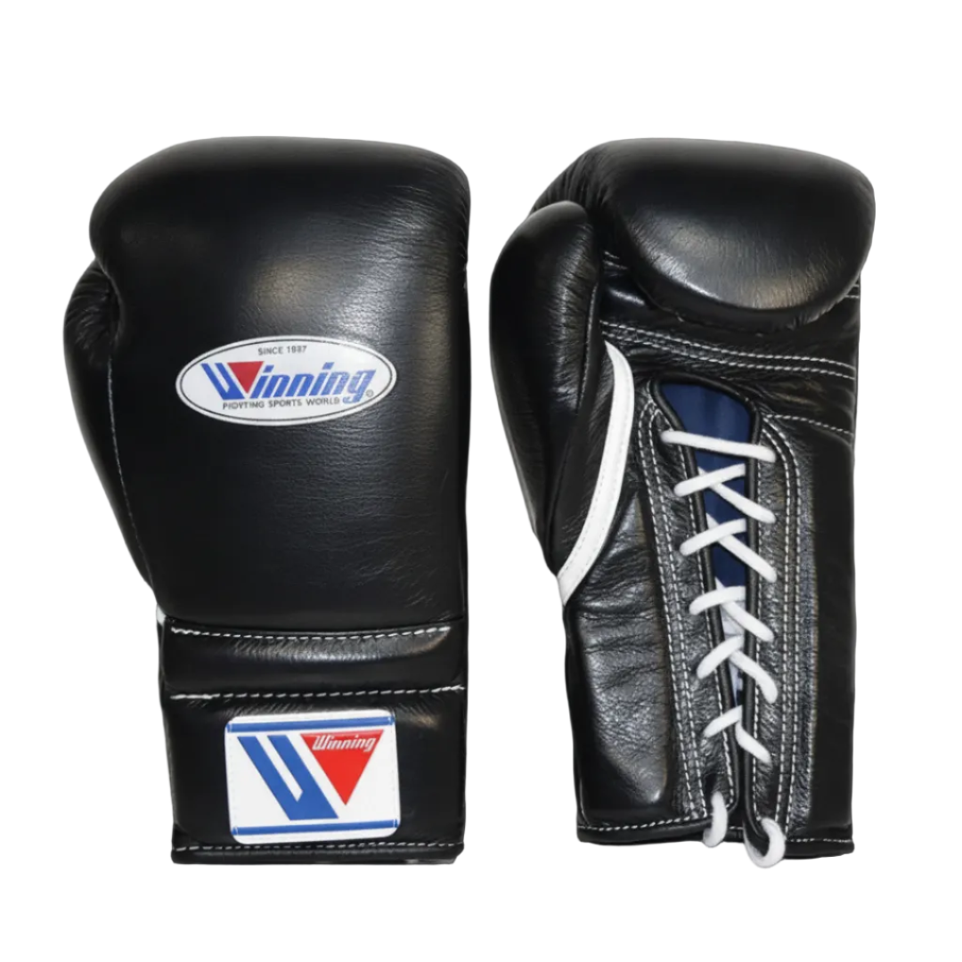 A pair of black leather boxing gloves with white laces and white stitching, featuring a visible Winning brand logo on the back and wrist strap, set against a dark gradient background.